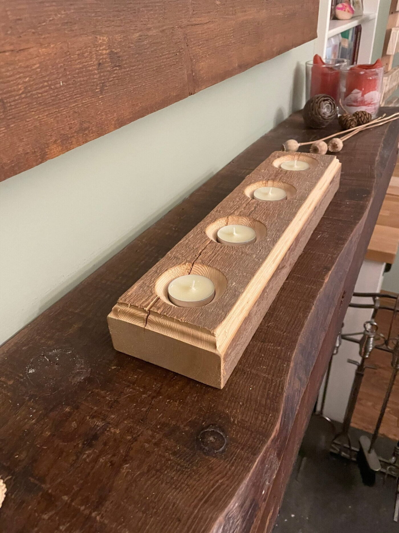 Rustic Advent Tealight Holder (4 Tealights, Reclaimed Timber) — in use