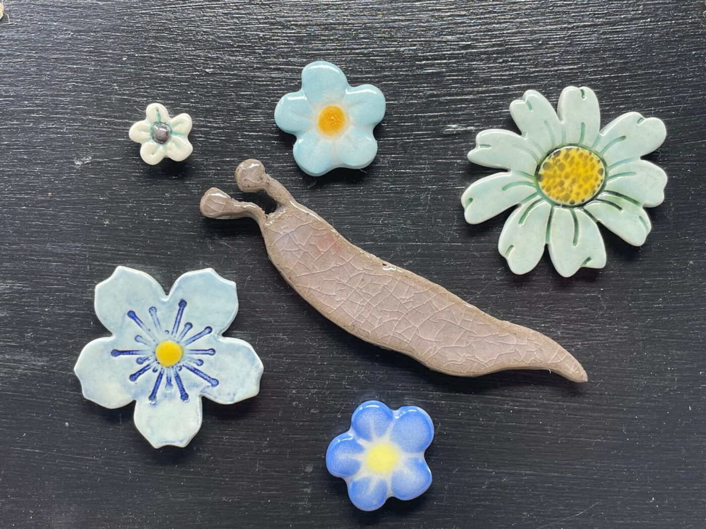Ceramic Slug & Blue Flowers Magnet Set — back view