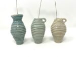 Coiled Mini Vase Trio (Bone, Blue, Teal) — in use
