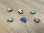 Pastel Ceramic Heart Magnets — Set of 6 (Terracotta) — in use