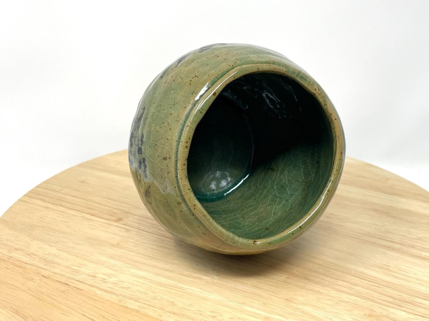 Speckled Yellow Coiled Vase with Crackle Glaze — in use