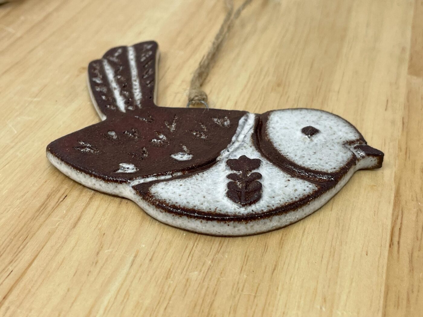 Hanging Ceramic Bird — Terracotta & White Glaze (Hearts) — scale view