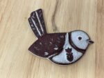 Hanging Ceramic Bird — Terracotta & White Glaze (Hearts) — in use