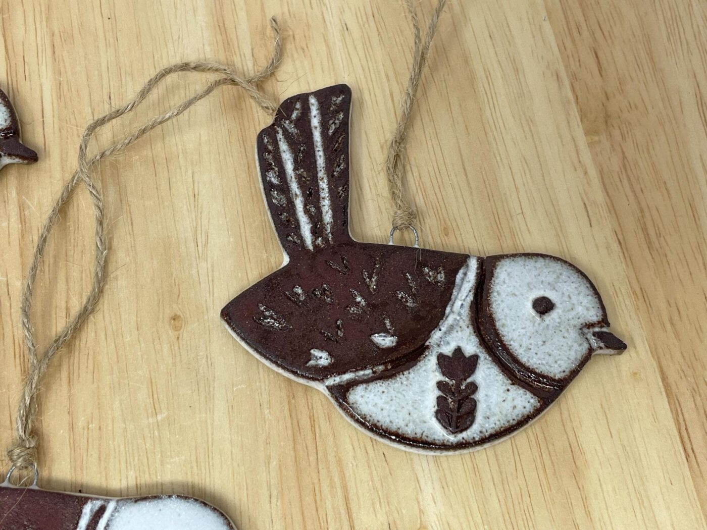 Hanging Ceramic Bird — Terracotta & White Glaze (Hearts) — top view