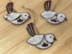 Hanging Ceramic Bird — Terracotta & White Glaze (Leaves) — detail view