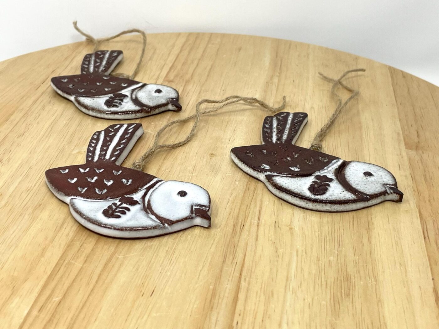 Hanging Ceramic Bird — Terracotta & White Glaze (Hearts) — side view