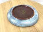 Handmade sunflower ceramic plate from above — terracotta clay — Fabode Ceramics