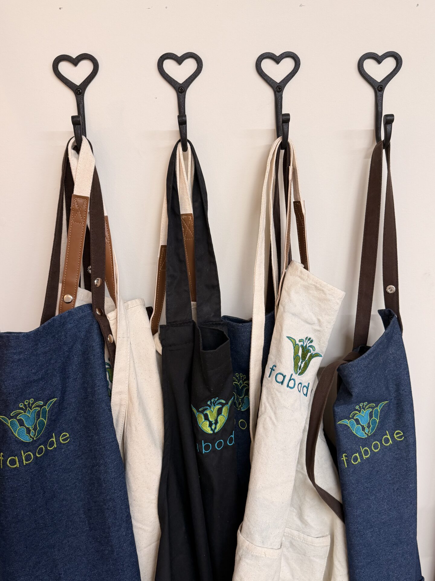 Fabode aprons ready for a ceramics workshop